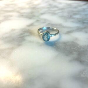 Blue topaz gemstone ring 925 sterling silver in size 7